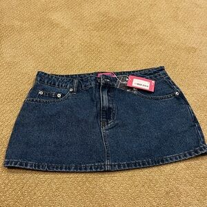 Edikted brand women Denim Mini Skirt size medium new with tags